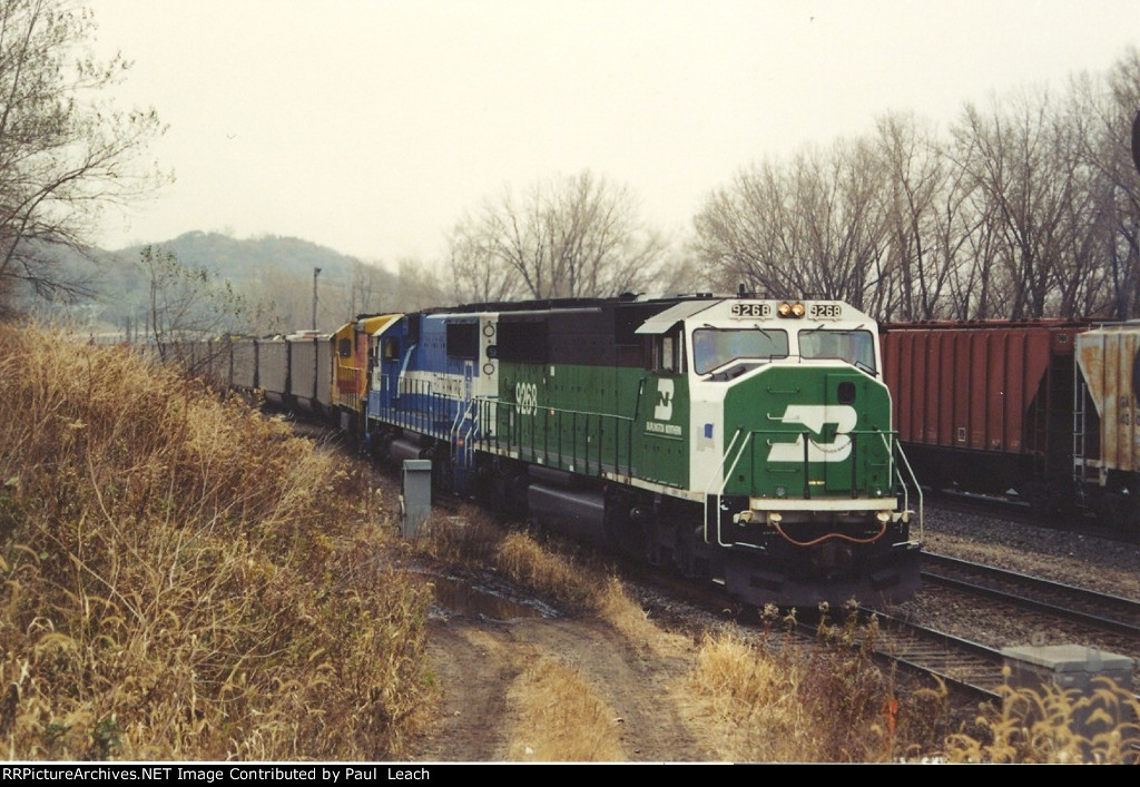 Coal empties ease west towards the yard and a crew change